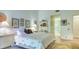 Bedroom with queen bed and access to bathroom at 7610 Fairway Woods Dr # 205, Sarasota, FL 34238