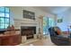 Fireplace with built-in shelving and hearth at 7610 Fairway Woods Dr # 205, Sarasota, FL 34238