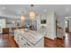 Spacious kitchen island with granite countertop and modern appliances at 7820 Seville Cir, Bradenton, FL 34209