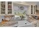 Bright and sunny kitchen window over the sink looking out to the pool at 7820 Seville Cir, Bradenton, FL 34209