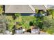 Aerial view showcasing backyard oasis with lush landscaping at 9367 Hawk Nest Ln, North Port, FL 34287