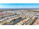 Aerial view of waterfront homes and community at 9367 Hawk Nest Ln, North Port, FL 34287