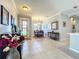 View of the dining room from entryway at 9367 Hawk Nest Ln, North Port, FL 34287