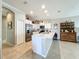 Modern kitchen with stainless steel appliances and white cabinets at 9367 Hawk Nest Ln, North Port, FL 34287