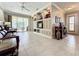 Living room features built-ins and sliding doors to patio at 9367 Hawk Nest Ln, North Port, FL 34287