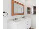 Bathroom with double vanity and modern fixtures at 939 Cronley Pl, Sarasota, FL 34237