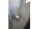 Simple, newly constructed powder room with white toilet and marble floor at 9493 St Paul Dr, Port Charlotte, FL 33981