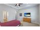 Spacious bedroom with wood dresser and carpet flooring at 1115 116Th E St, Bradenton, FL 34212
