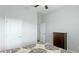 Spacious bedroom with dresser and access to a bathroom at 1115 116Th E St, Bradenton, FL 34212