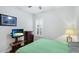 Bedroom with a flat-screen TV and ample closet space at 1115 116Th E St, Bradenton, FL 34212
