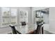 Bright dining area with granite table and access to backyard patio at 1115 116Th E St, Bradenton, FL 34212