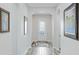 Bright and spacious entryway with tile floors and framed artwork at 1115 116Th E St, Bradenton, FL 34212