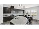 Modern kitchen with granite countertops and stainless steel appliances at 1115 116Th E St, Bradenton, FL 34212