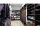 Spacious walk-in closet with ample shelving and hanging space at 1115 116Th E St, Bradenton, FL 34212