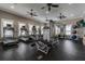 Well-equipped fitness center with treadmills, weight machines, and ample space for workouts at 11343 Spring Gate Trl, Bradenton, FL 34211