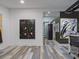 Bright studio space featuring artwork and hardwood floors at 1330 N Lockwood Ridge Rd, Sarasota, FL 34237