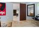 Elegant entryway with barn door and large mirror at 1330 N Lockwood Ridge Rd, Sarasota, FL 34237