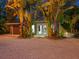 Inviting exterior with lush landscaping and modern garage at 1330 N Lockwood Ridge Rd, Sarasota, FL 34237