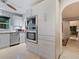 Modern kitchen with stainless steel appliances and light cabinets at 1330 N Lockwood Ridge Rd, Sarasota, FL 34237