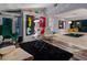 Open living area showcasing stylish furniture and large-scale art at 1330 N Lockwood Ridge Rd, Sarasota, FL 34237