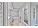 Updated bathroom with marble-look tile and new vanity at 14820 Rue De Bayonne # 308, Clearwater, FL 33762