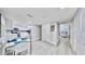 Dining area next to the kitchen boasts modern table, chairs, and neutral decor at 14820 Rue De Bayonne # 308, Clearwater, FL 33762