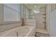 The primary bathroom is a retreat with a soaking tub and tiled shower with a bench at 16307 29Th E Ct, Parrish, FL 34219