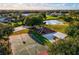 Aerial view of the community playground, basketball court, and other amenities at 16307 29Th E Ct, Parrish, FL 34219