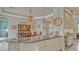 Spacious kitchen featuring granite countertops and an open view of the dining room at 16307 29Th E Ct, Parrish, FL 34219