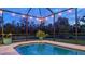 Inviting pool with spa and covered lanai for outdoor enjoyment at 16307 29Th E Ct, Parrish, FL 34219