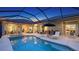 Outdoor living space features a pool, spa and screened in patio at 16307 29Th E Ct, Parrish, FL 34219