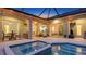 Beautiful pool and spa on the outdoor patio for relaxing and entertaining at 16307 29Th E Ct, Parrish, FL 34219