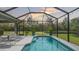 Screened pool with a view of the landscaping at 16307 29Th E Ct, Parrish, FL 34219