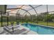 Screened pool with a view of the landscaping at 16307 29Th E Ct, Parrish, FL 34219