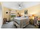 Bedroom with queen bed and ceiling fan at 1670 Oak View Dr, Sarasota, FL 34232