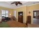 Spacious main bedroom with work area and doorway to other parts of the home at 189 Savona Way, North Venice, FL 34275