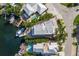 Bird's-eye view of home and canal at 201 N Harbor Dr, Holmes Beach, FL 34217