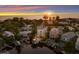 Modern home with waterfront access at sunset at 201 N Harbor Dr, Holmes Beach, FL 34217