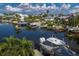 Aerial view of waterfront homes and boats at 201 N Harbor Dr, Holmes Beach, FL 34217