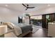 Bedroom with balcony access and city views at 201 N Harbor Dr, Holmes Beach, FL 34217