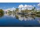 Aerial view of waterfront homes and boats at 201 N Harbor Dr, Holmes Beach, FL 34217