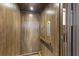 Modern wood-paneled elevator for convenient access at 201 N Harbor Dr, Holmes Beach, FL 34217