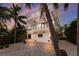 Modern three-story home with waterfront access at 201 N Harbor Dr, Holmes Beach, FL 34217