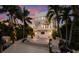 Modern three-story home with waterfront access at 201 N Harbor Dr, Holmes Beach, FL 34217