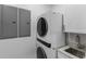Convenient laundry room with stackable washer and dryer at 201 N Harbor Dr, Holmes Beach, FL 34217