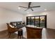 Spacious living room with leather furniture and sunset view at 201 N Harbor Dr, Holmes Beach, FL 34217