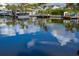 Manatee in the water near the dock at 201 N Harbor Dr, Holmes Beach, FL 34217