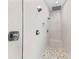 Large walk-in shower with multiple shower heads and bench at 201 N Harbor Dr, Holmes Beach, FL 34217