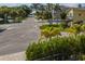 Quiet residential street with palm trees and colorful houses at 201 N Harbor Dr, Holmes Beach, FL 34217