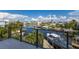 Stunning waterfront view with boats and lush tropical landscape at 201 N Harbor Dr, Holmes Beach, FL 34217